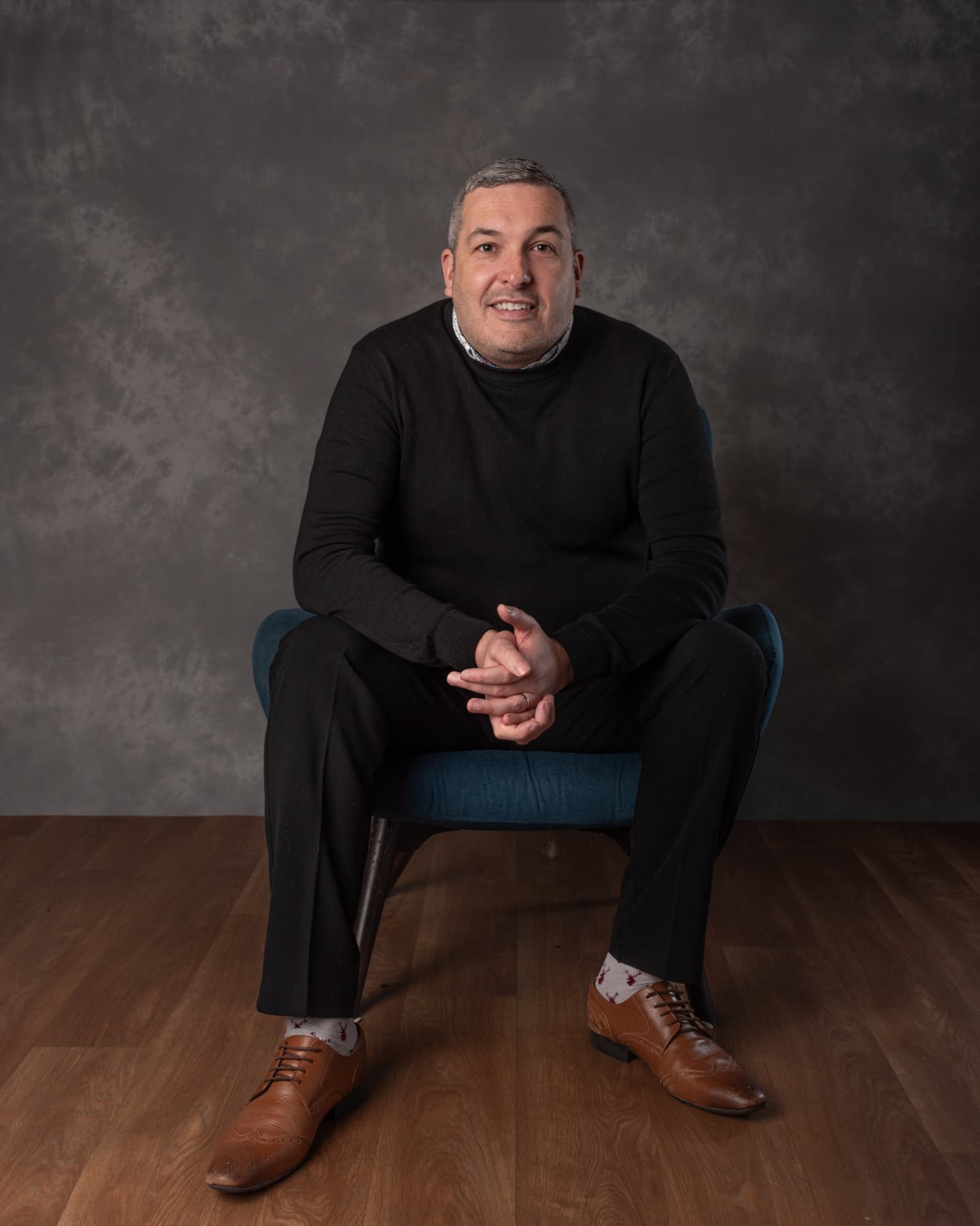 Chris G Jones seated portrait